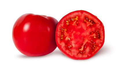 Image showing One and a half ripe juicy red tomatoes