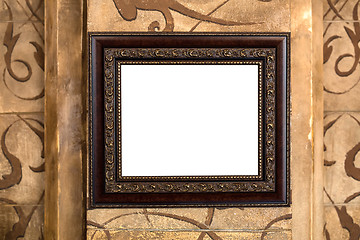 Image showing Wooden old frame on the wall with empty content