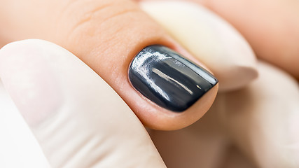 Image showing Manicure process in a beauty salon.