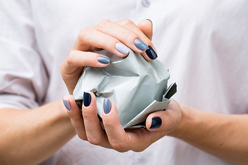 Image showing Stylish manicure in shades of gray female elegant handles.