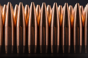 Image showing Macro shot of copper bullets that are in many row