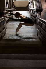 Image showing Graceful ballerina standing in a graceful pose