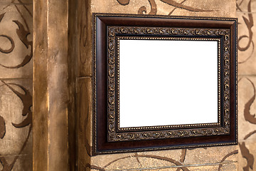 Image showing Wooden old frame on the wall with empty content