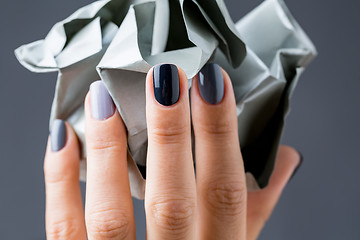 Image showing Stylish manicure in shades of gray female elegant handles.