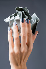 Image showing Stylish manicure in shades of gray female elegant handles.