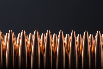 Image showing Macro shot of copper bullets that are in many row