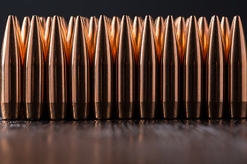 Image showing Macro shot of copper bullets that are in many row