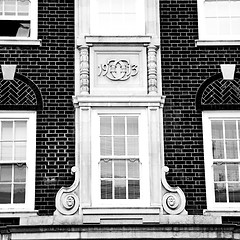 Image showing old window in europe london  red brick wall and      historical 