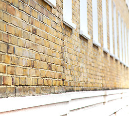 Image showing old window in europe london  red brick wall and      historical 