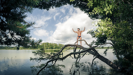 Image showing muscular man lake