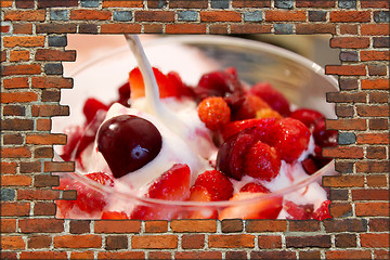 Image showing brick wall and icecream with berries