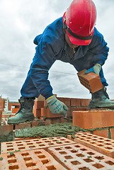 Image showing Construction mason worker bricklayer under working