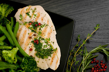 Image showing Delicious portion of chicken breast with steamed vegetables
