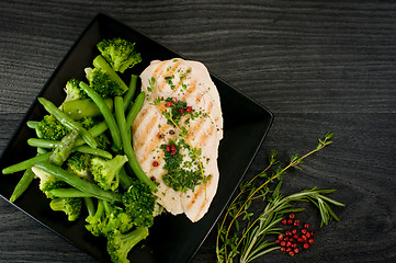 Image showing Delicious portion of chicken breast with steamed vegetables