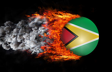 Image showing Flag with a trail of fire and smoke - Guyana