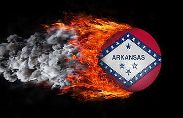 Image showing Flag with a trail of fire and smoke - Arkansas