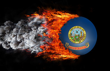 Image showing Flag with a trail of fire and smoke - Idaho