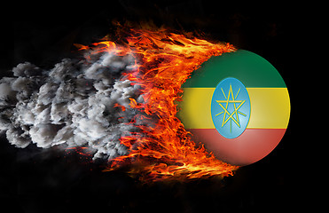 Image showing Flag with a trail of fire and smoke - Ethiopia