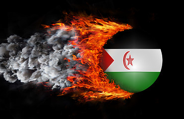 Image showing Flag with a trail of fire and smoke - Western Sahara