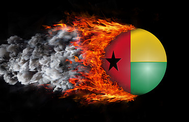 Image showing Flag with a trail of fire and smoke - Guinea Bissau