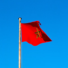 Image showing tunisia  waving flag in the blue sky  colour and battlements  wa