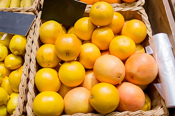 Image showing ripe grapefruits at food market