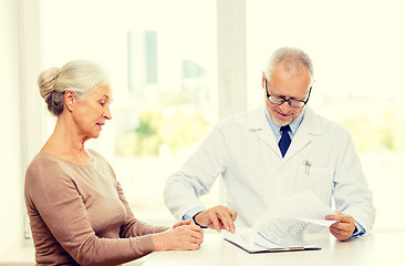 Image showing senior woman and doctor meeting