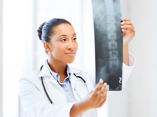 Image showing african doctor looking at x-ray