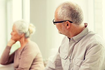 Image showing senior couple sitting on sofa at home