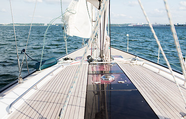 Image showing close up of sailboat or sailing yacht deck and sea