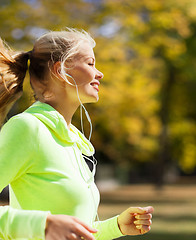 Image showing woman doing running outdoors