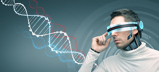 Image showing man with futuristic 3d glasses and sensors