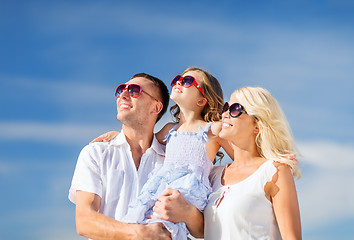 Image showing happy family with blue sky