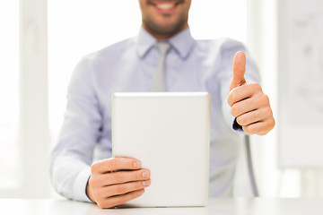 Image showing close up of businessman hands with tablet pc