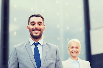 Image showing close up of smiling businessmen