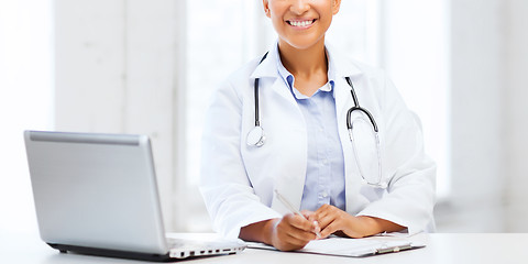 Image showing female doctor with laptop pc