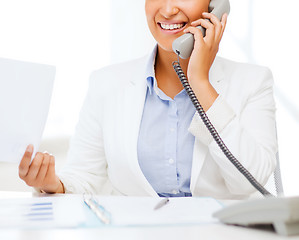 Image showing african businesswoman with phone in office