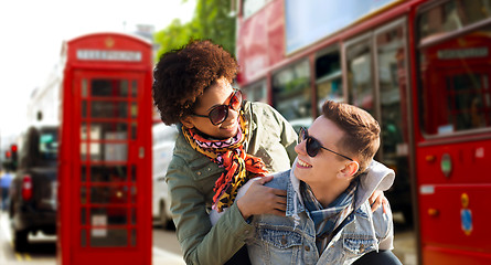 Image showing happy teenage couple having fun in london city