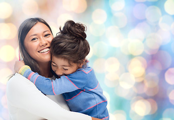 Image showing happy mother and daughter hugging