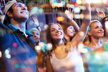 Image showing group of happy friends at concert in night club