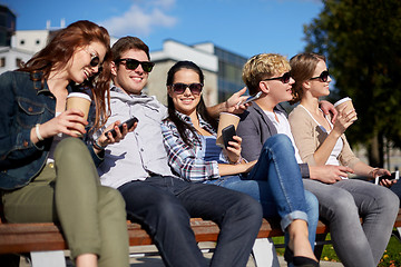 Image showing group of students or teenagers drinking coffee