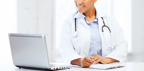 Image showing female doctor with laptop pc