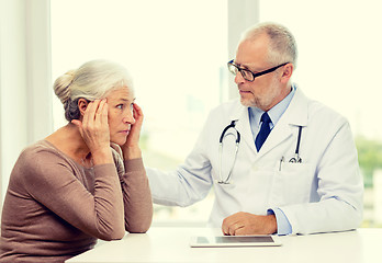 Image showing senior woman and doctor with tablet pc