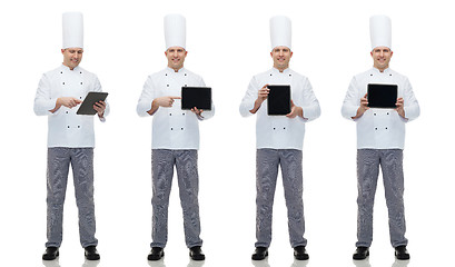 Image showing happy male chef cook showing with tablet pc