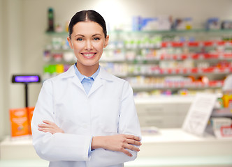 Image showing young woman pharmacist drugstore or pharmacy