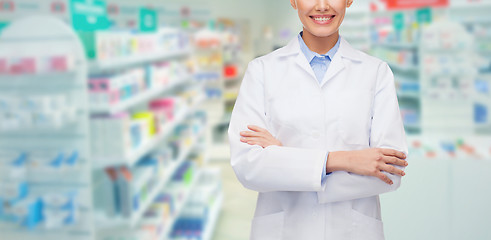 Image showing young woman pharmacist drugstore or pharmacy