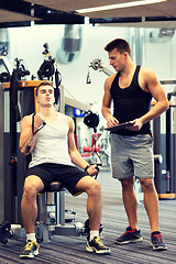 Image showing man exercising on gym machine