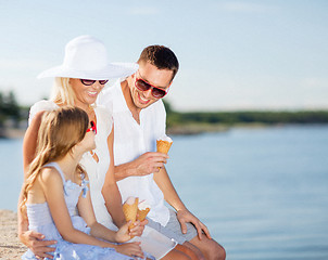 Image showing happy family eating ice cream