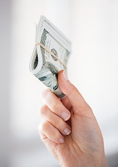 Image showing close up of woman hands holding us dollar money