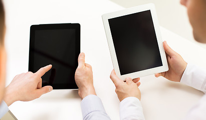 Image showing close up of businessman hands with tablet pc